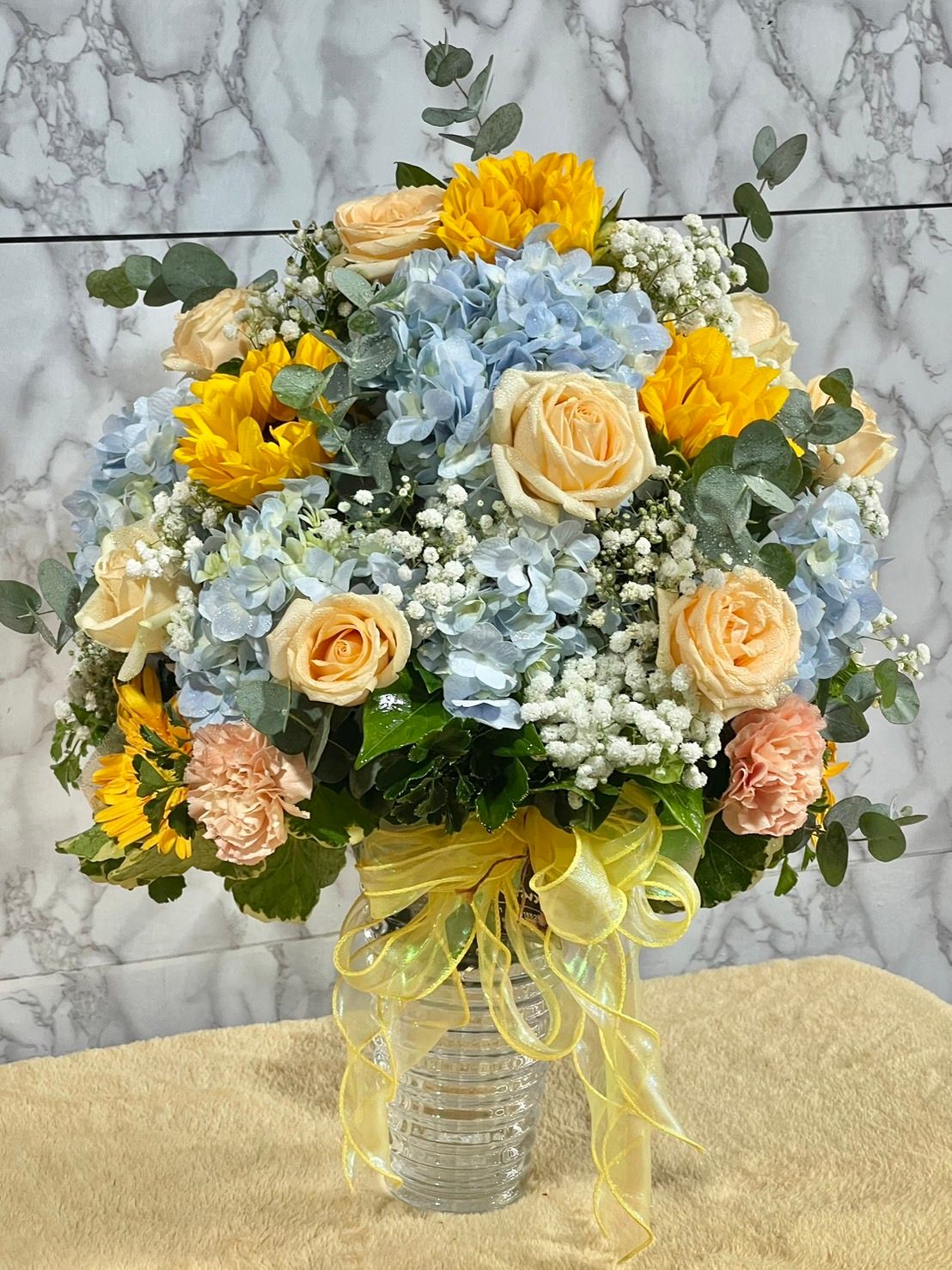 Blue hydrangea with sunflower